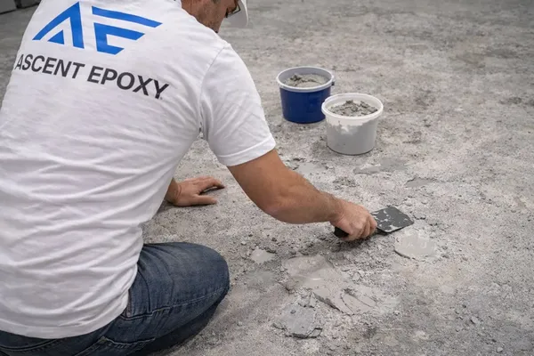 Grinding and preparing concrete after coating removal in Lee County